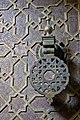 Geometric motifs on the bronze plating of the doors of the Al-Attarine Madrasa