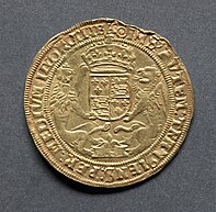 Gold coin showing a heraldic shield