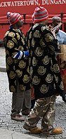 Igbo Nigerian men, wearing the modern Isiagu with traditional Igbo men's hat