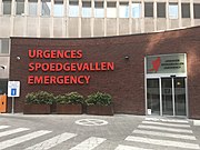 Trilingual signage in French, Dutch and English at an emergency department in Brussels, Belgium