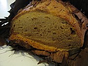 Damper (bread) is usually cooked over hot coals