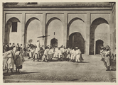 1922 photo showing the sultan in the Inner Mechouar, returning from prayers at the Great Mosque of Fes el-Jdid which was directly connected to the palace[10]