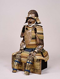 Gusoku Type Armor Two-piece cuirass with bared chest design. Gold leaf is pasted on several itazane to express the chest of an old man, and colored thread is pasted to express kozane. Azuchi–Momoyama or Edo period, 16th–17th century, Tokyo National Museum