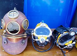 Heavy standard diving helmet, lightweight demand helmet and band mask