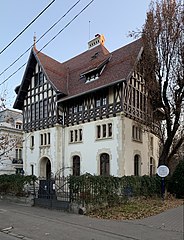 Tudor Revival - Dr. Petre Herescu House on Bulevardul Dacia, Bucharest, by Grigore Cerchez, 1911-1913[52]