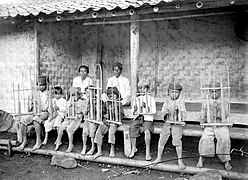Sundanese boys playing the angklung in 1918.