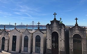 Mausoleums with the 25 de Abril Bridge in the background