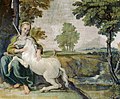 This is a painting of a woman embracing a unicorn.