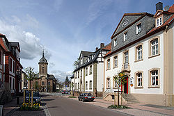 The Schlossstrasse in the central district of Bad Arolsen - in the far west the Kirchplatz with church