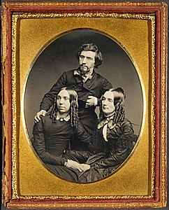 Brady with his wife Juliet Handy Brady (front left) and sister Ellen Brady Haggerty (front right)