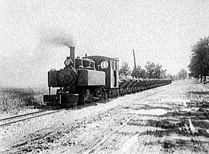One of the military 2-6-2T pulling 4-wheel side dump cars for a Michigan construction project in 1921.