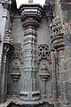 Wall relief, turret, pilasters with miniature decorative towers in Mallikarjuna temple at Kuruvatti