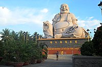 Statue of Budai at Vĩnh Tràng Temple in Vietnam.