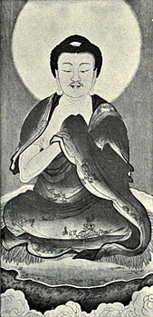 Black and white reproduction of a portrait of Sakyamuni (the Buddha), attributed to Wu Daozi, published in 12th edition of Encyclopædia Britannica (1911)