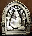 Niche with the Buddha and two monks, 3rd-4th century CE.[14][15]