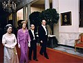 President Gerald Ford, First Lady Betty Ford, Japanese Emperor Hirohito and Empress Nagako walk to the East Room prior to a state dinner, 1975