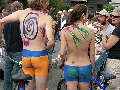 Seattle's nudist cyclists with painted buttocks