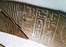 Closeup of the ivory wand showing the king's name.