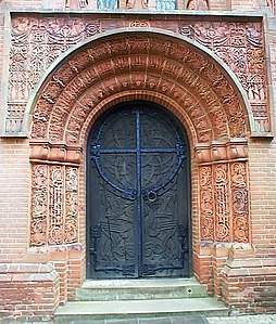 Portal of Watts Cemetery Chapel by Mary Fraser-Tytler in Compton, Surrey
