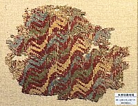 Carpet from Yanghai-1, 7th century BCE.[13]