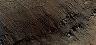 Close view of layers on crater wall, as seen by HiRISE under HiWish program