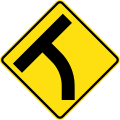 (W2-14) T-junction beyond a curve to left