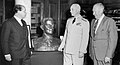 De Weldon (left) presents his bust of U.S. Navy Admiral of the Fleet Chester W. Nimitz to the Naval War College on 5 June 1964. President of the Naval War College Vice Admiral Bernard L. Austin (center) and retired U.S. Marine Corps Lieutenant General Keller E. Rockey look on.