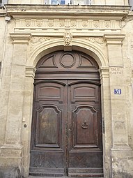 Baroque Doric pilasters and entablature on the facade of the Hôtel de Castries (Rue Saint-Guilhem no. 31), Montpellier, France, by Simon Levesville, 1647[22]