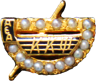 Crown Pearl Badge of Kappa Kappa Psi.