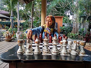 A girl playing chess in Salatiga, Indonesia.