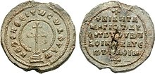 Lead seal with cross surrounded by legend on the obverse and a simple legend in the reverse