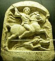 Thracian horseman with hound and boar, Greek inscription (3rd century BC), Teteven museum