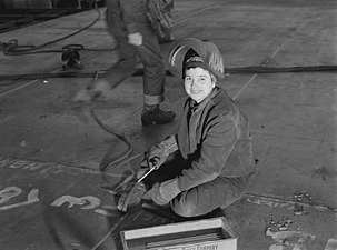 A "Wendy the Welder" at the Kaiser Richmond Shipyards, contributing to the war effort