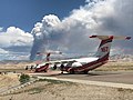 The fire seen from Grand Junction Regional Airport with airplanes used for aerial firefighting in foreground on August 3.