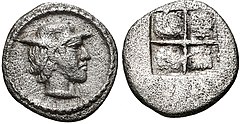 Coin of Alexander I, struck circa 460-450 BC. Young male head right, wearing a petasos.