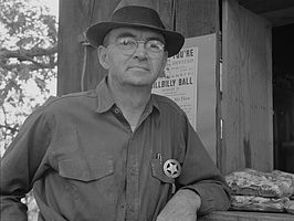 A Josephine County, Oregon sheriff's deputy pictured in 1939 wearing civilian clothes. Particularly in rural areas, sheriff's offices were slow to adopt uniforms.