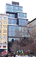 15 Union Square West was a cast-iron building constructed for Tiffany & Company in 1870. In 2007, a steel-and-glass facade was added in front of the cast-iron facade when it was converted into condominium apartments