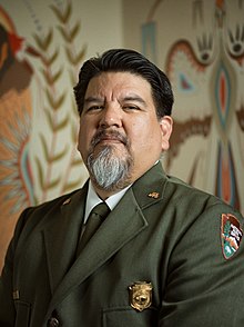 Official portrait of Chuck Sams as director of the National Park Service