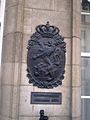 Plaque outside the embassy depicting the Coat of arms of Luxembourg, lesser version