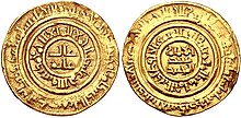Photo of the two sides of a gold coin with circular Arabic inscriptions