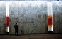 Travertine walls together with op art ceramic mosaics by Wojciech Fangor in a railway station in Warsaw, Poland (1963).