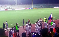 Parading Philippine national team players celebrating their win and thanking fans in attendance