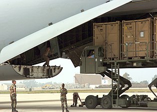 U.S. Navy load Tricon containers into a Lockheed C-5 Galaxy transport aircraft (2006)