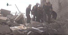 White Helmets looking for survivors in Arbin