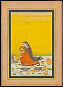 A woman preparing a meal. Kangra, c. 1810