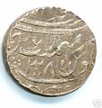 A silver ashrafi issued by Asaf-ud-Daula from the Najibabad mint in AH 1211 (1796/7), regnal year 38