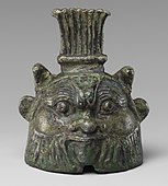 Bell in the form of Bes; 332-30 BC; cupreous metal; height: 6.3 cm, diameter: 4.6 cm; Metropolitan Museum of Art