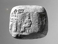 Cuneiform tablet impressed with cylinder seal. Receipt of goats, c. 2040 BC, year 7 of Amar-Sin. Neo-Sumerian.[35]