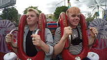 Niki and Sammy Albon at the bottom of the Orlando Slingshot reverse bungee ride, clutching the handles on the seats, in May 2017