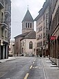 In den Strassenschluchten von Genf ist dieses Kirchengebäude eher unscheinbar.